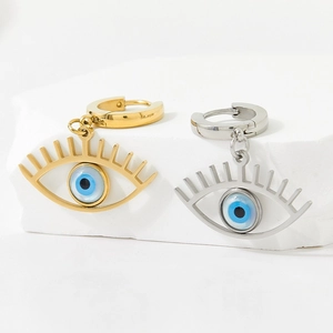 Boucles d'oreilles créoles Œil Mauvais en or et argent avec détails en émail bleu