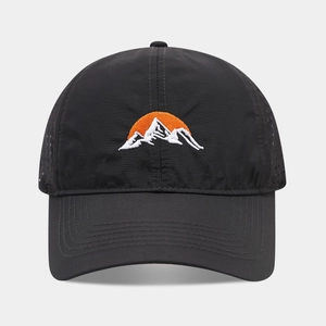 Breathable black baseball cap with orange sunrise peak embroidery and laser-cut vents