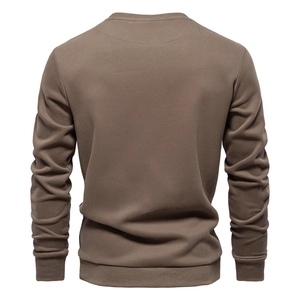 Rear view of brown cotton long sleeve sweatshirt showing ribbed cuffs and neckline