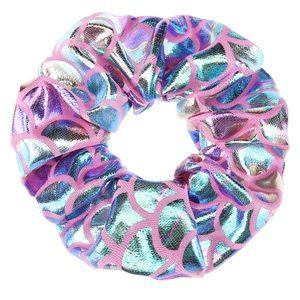 Close-up of pink mermaid scale hair scrunchie with holographic laser foil texture
