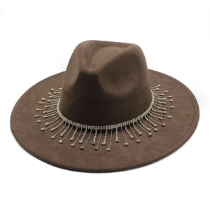 Detailed view of dark brown suede bridal fedora featuring shimmering rhinestone tassels