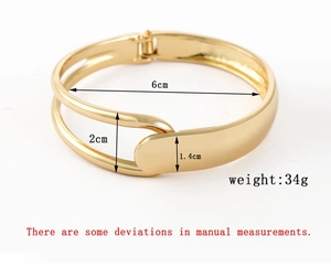 Detailed view of gold multi-layer open bracelet with size measurements and 6cm inner diameter