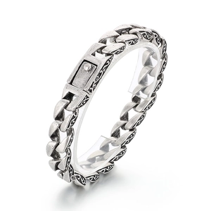 Vintage style stainless steel chain bracelet with embossed floral texture and antique silver finish