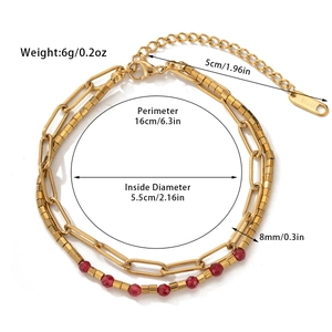 Detail view of double-layer gold titanium steel bracelet with red natural stone beads