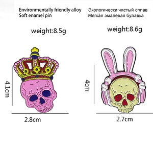 Cute skull enamel pins featuring pink crown and bunny ear headphones styles