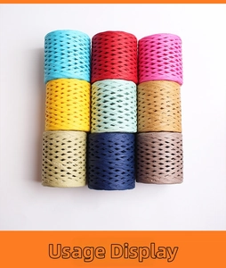 Nine colorful rolls of raffia paper ribbon for gift wrapping and DIY handweaving crafts