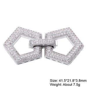 Macro view of crystal paved interlocking jewelry clasps with silver finish for necklaces