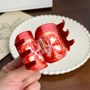 Cute red strawberry hair claw clip made of resin for stylish half-up ponytails