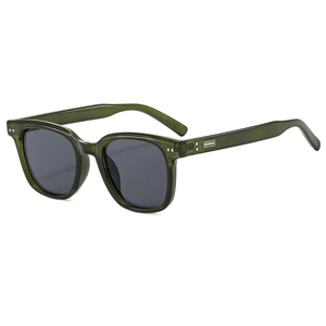 Retro translucent green sunglasses with dark grey lenses and metallic rivet details