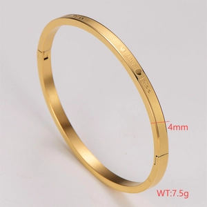 Detail of 4mm gold-plated stainless steel oval bangle with Love Kiss engraving