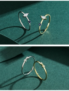 Dettaglio di anelli in argento S925 con pietre marquise e fiocchi di diamanti
