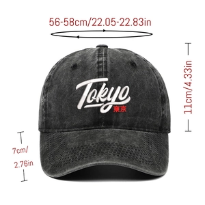 Washed dark grey denim baseball cap featuring Tokyo embroidery and a curved brim