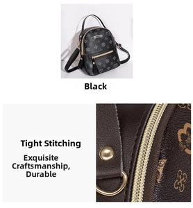 Detail view of mini backpack featuring grey floral monogram and gold metal zipper with stitching