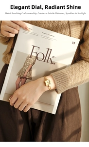Close-up of a vintage square gold watch for women with an elegant chain-link strap