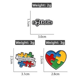 Detailed view of colorful autism awareness enamel pins with sizes and weight dimensions