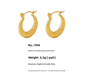 Detailed view of gold PVD plated stainless steel C-hoop earrings with hammered texture