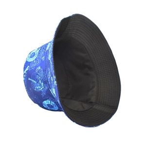 Detail view of double-sided bucket hat with blue floral patterns and black inner lining