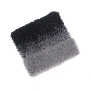 Close-up of plush faux fur neck warmer with black and grey gradient knit texture