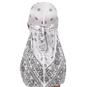 Silky white paisley durag with long ties and smooth finish for outdoor fashion use