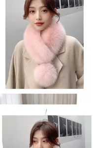 Detailed view of pink faux fur collar with pom-poms on a winter wool coat