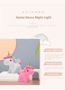 Detailed close-up of cute white and pink unicorn night lights for bedroom decor