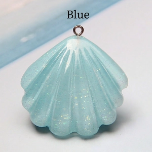 Blue translucent resin shell pendant with colorful glitter and silver metal ring