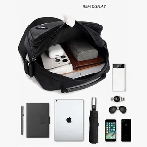 Multifunctional black crossbody bag showing internal storage capacity for iPad and gadgets
