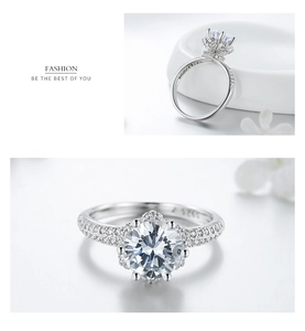 Macro detail of S925 sterling silver crown ring with brilliant round cut pavé diamonds