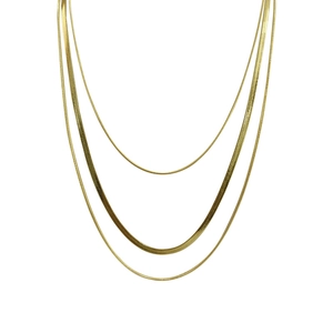 Layered gold titanium steel necklace featuring sleek snake bone chains for a chic stacked look
