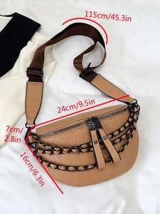 Brown crocodile embossed chest bag with black metal chains and wide adjustable strap