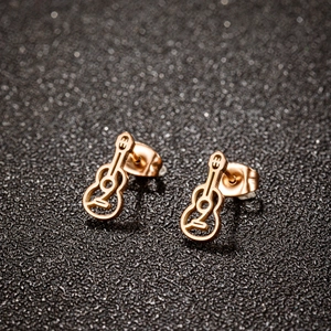 Minimalist hollow guitar stud earrings in gold finish for a stylish music lover look