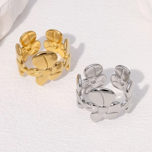 Minimalist flower-shaped stainless steel open ring set in gold and silver finishes