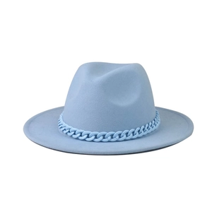 Detail of light blue wool jazz hat featuring matching chunky chain accessory on white background