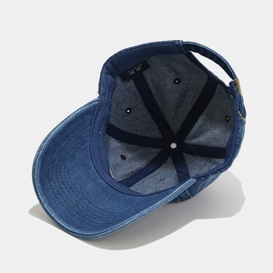 Dark blue denim baseball cap with New York embroidery and adjustable metal buckle