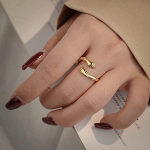 Minimalist 925 sterling silver hug ring in gold finish shown on model finger