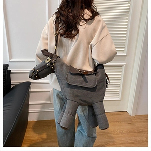 Model wearing a funny donkey shaped grey canvas crossbody bag with adjustable strap
