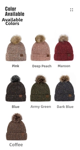 Detailed grid of knitted beanies with faux fur pom-poms in seven assorted colors