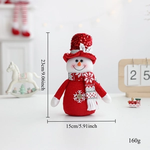 Detail of plush Christmas snowman doll with red sequin hat and embroidered snowflake scarf