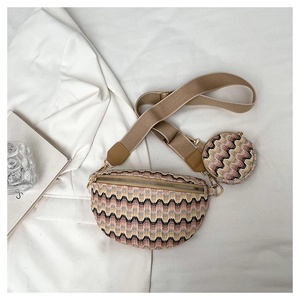 Flat lay of colorful knit wavy pattern waist bag and round coin purse with gold hardware