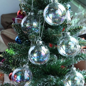 Iridescent transparent PET Christmas balls hanging on a tree for holiday party decoration