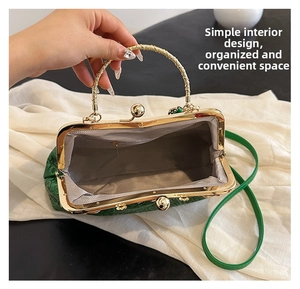Detail of green embossed shell bag featuring herringbone lining and inner zipper pocket