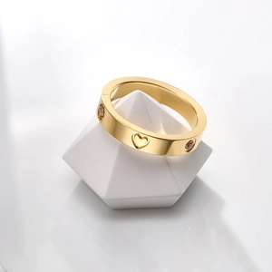 18K gold plated titanium heart ring with hollow heart patterns and cubic zirconia stones