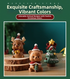 Detailed view of resin Christmas miniatures with Santa bear, deer, and holiday tree