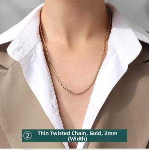 Detailed close-up of a 2mm wide twisted rope chain necklace in 18K gold plated titanium