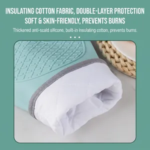 Green silicone oven mitt with thick quilted cotton lining for heat protection