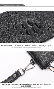 Close-up of black crocodile embossed leather texture with metal hook and fine stitching