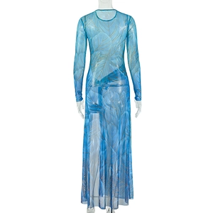 Detailed back view of a blue long-sleeve mesh dress with leaf print and slit