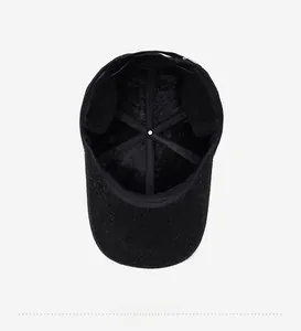 Detail of warm fleece lining inside the black winter baseball cap for men