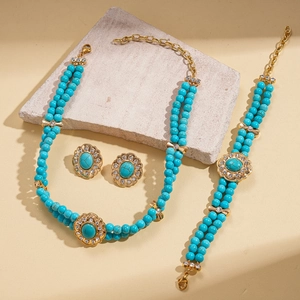 Detail of bohemian double-layer jewelry set with turquoise beads and crystal accents