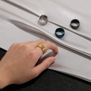 Detailed view of 10mm stainless steel mesh rings in gold silver blue and black finishes